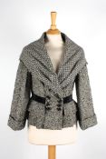 A Louis Vuitton wool jacket.with herringbone black and white pattern, shawl collar, velvet band