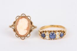 An 18ct gold, diamond and sapphire ring, set with three sapphires interspersed with two smaller