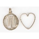 A Georg Jensen silver heart shaped pendant
together with another silver pendant with applied Scorpio