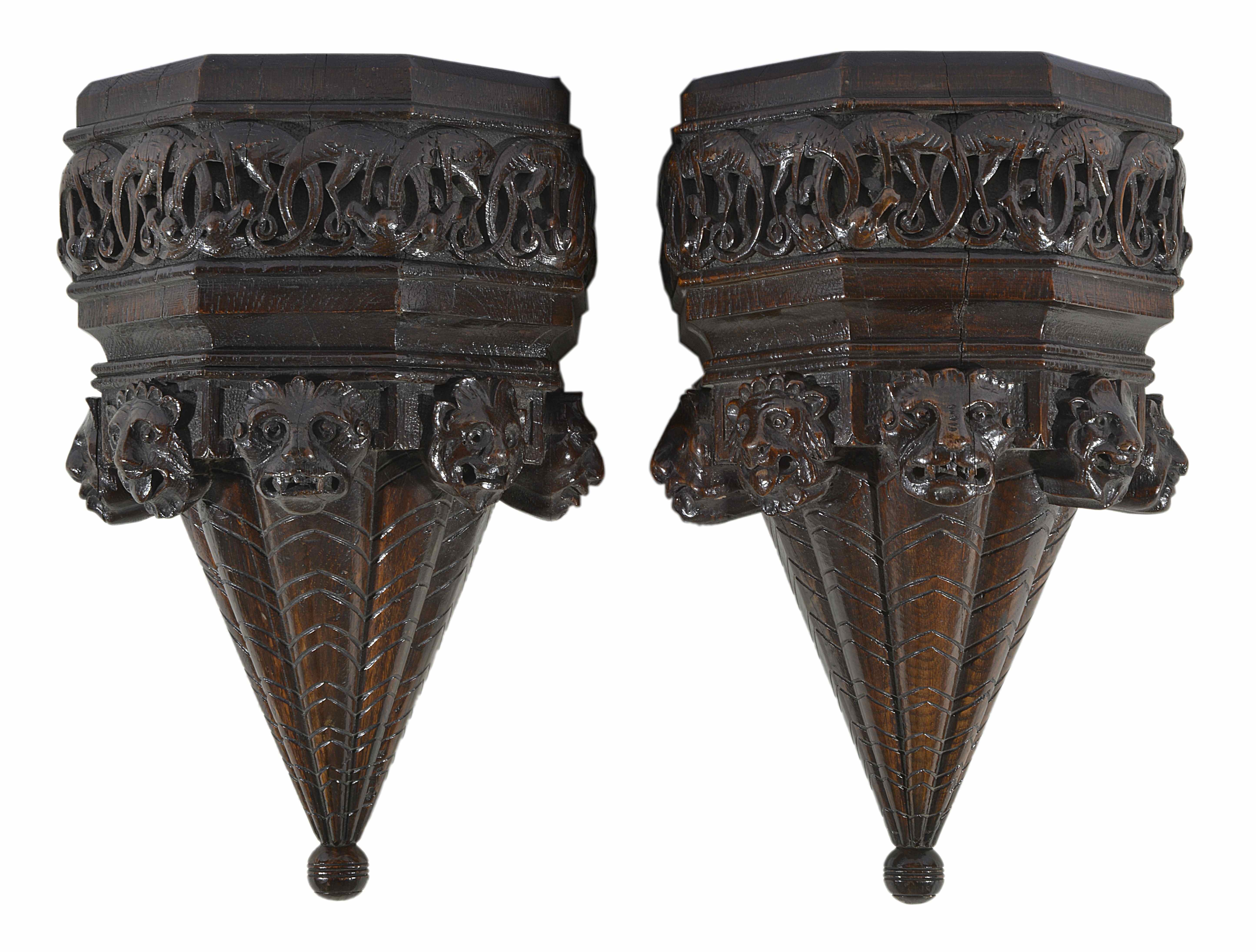 A pair of carved oak wall brackets
possibly late 17th century/early 18th century
the upper tier