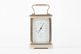 A 20th century Garrard & Co. silver plated carriage clockwith white dial and black Roman