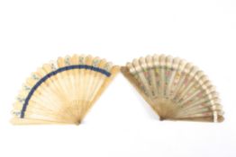 Two Regency horn brise fansthe first with pierced sticks and guards sticks, and sticks hand painted