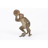 An early 20th century Austrian cold painted bronze monkey
stood in a dancing pose holding cymbals,
