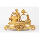 A late 19th century French ormolu figural mantle clock by Henry Marc
formed as a seated mother and