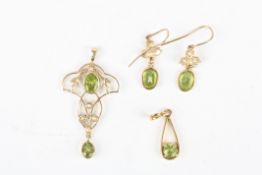 An Edwardian style 9ct gold, seed pearl and peridot pendant and earrings the pendant of scrolled