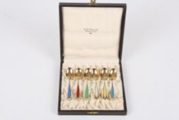 A set of six Norwegian silver gilt and enamel spoonsin a fitted case, retailed by Birger Olberg,