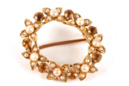 A gold, seed pearl and citrine wreath broochset with seed pearl flower heads interspersed by