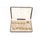 A set of twelve silver gilt and enamel coffee spoons by David Andersen, Stockholm
the stems with