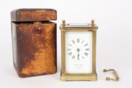 A French brass carriage clockretailed by Drew & Sons, Piccadilly Circus, London, the plain brass