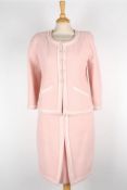 A pink Chanel wool skirt suitsingle breasted jacket with pale pink satin trim, two pockets to