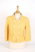 A canary yellow Christian Dior wool jacketdouble breasted, two faux pockets to the front, eight