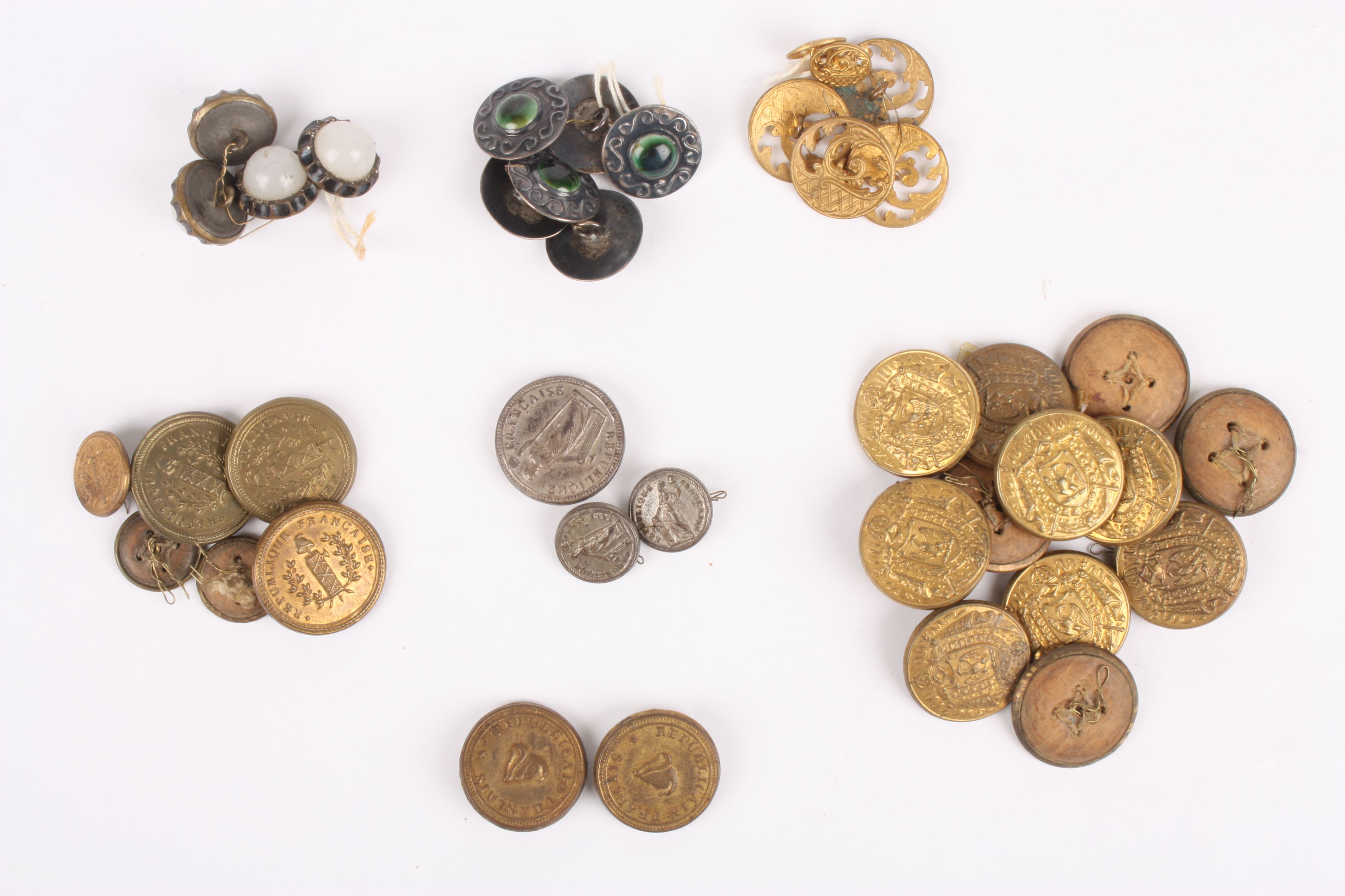 A large collection of assorted buttons 
including thirteen French Empire buttons, six Victorian