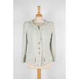 A Chanel grey checked boucle jacket.
with lime and white checked pattern, with white, grey and