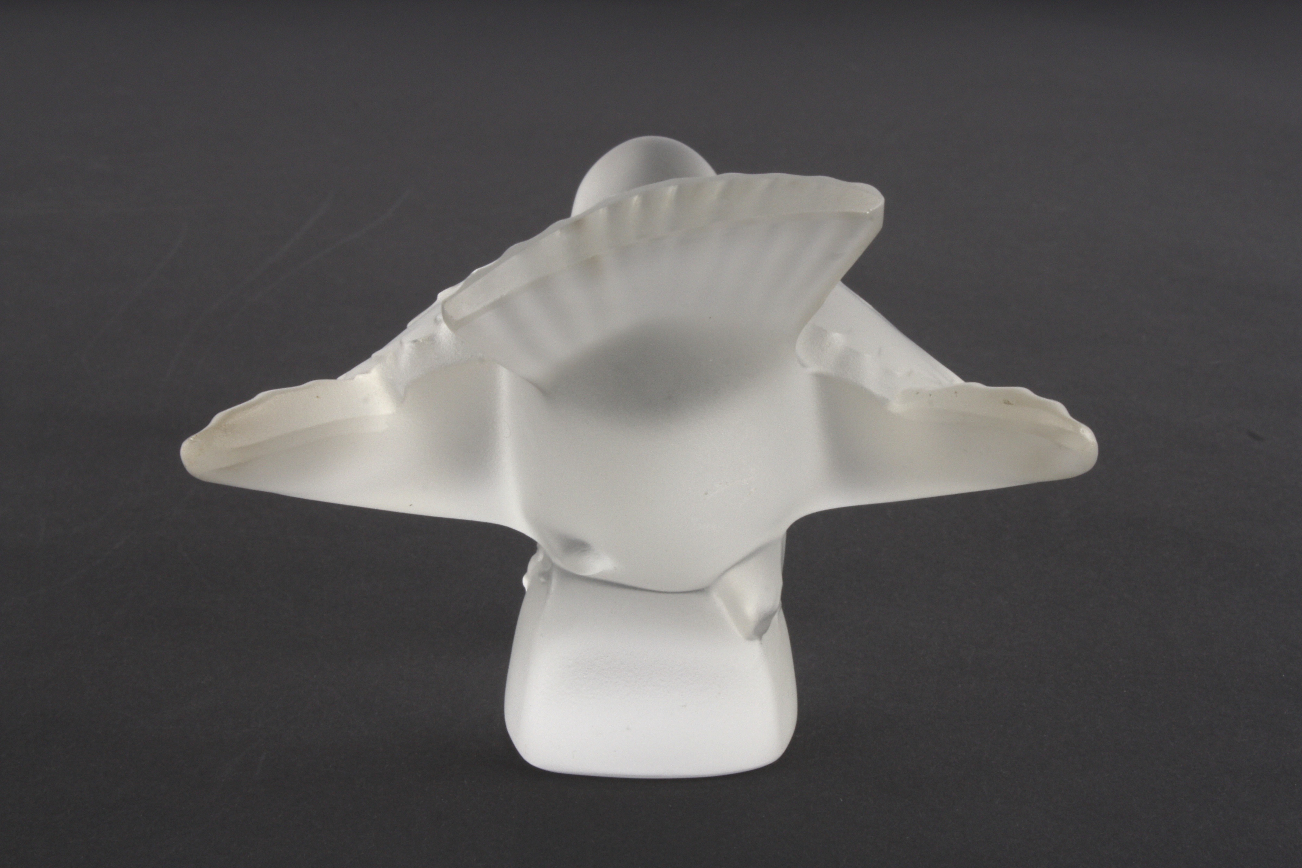 A Lalique frosted glass bird
in crouching pose with wings outswept. Etched signature to base ' - Image 4 of 5