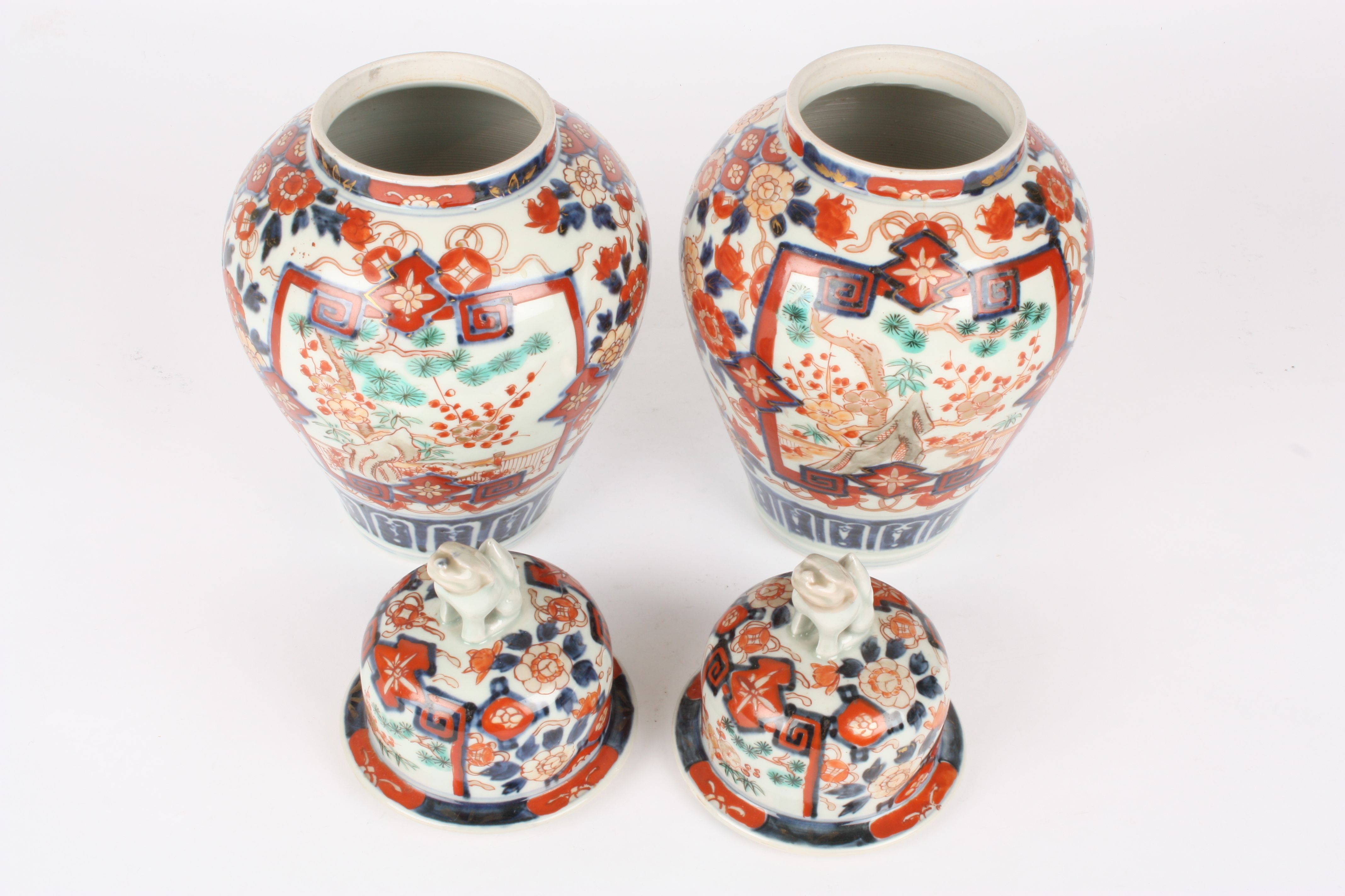 A pair of late 19th century Japanese Imari vases and covers
the lids crested with dogs of foe, the - Image 3 of 4