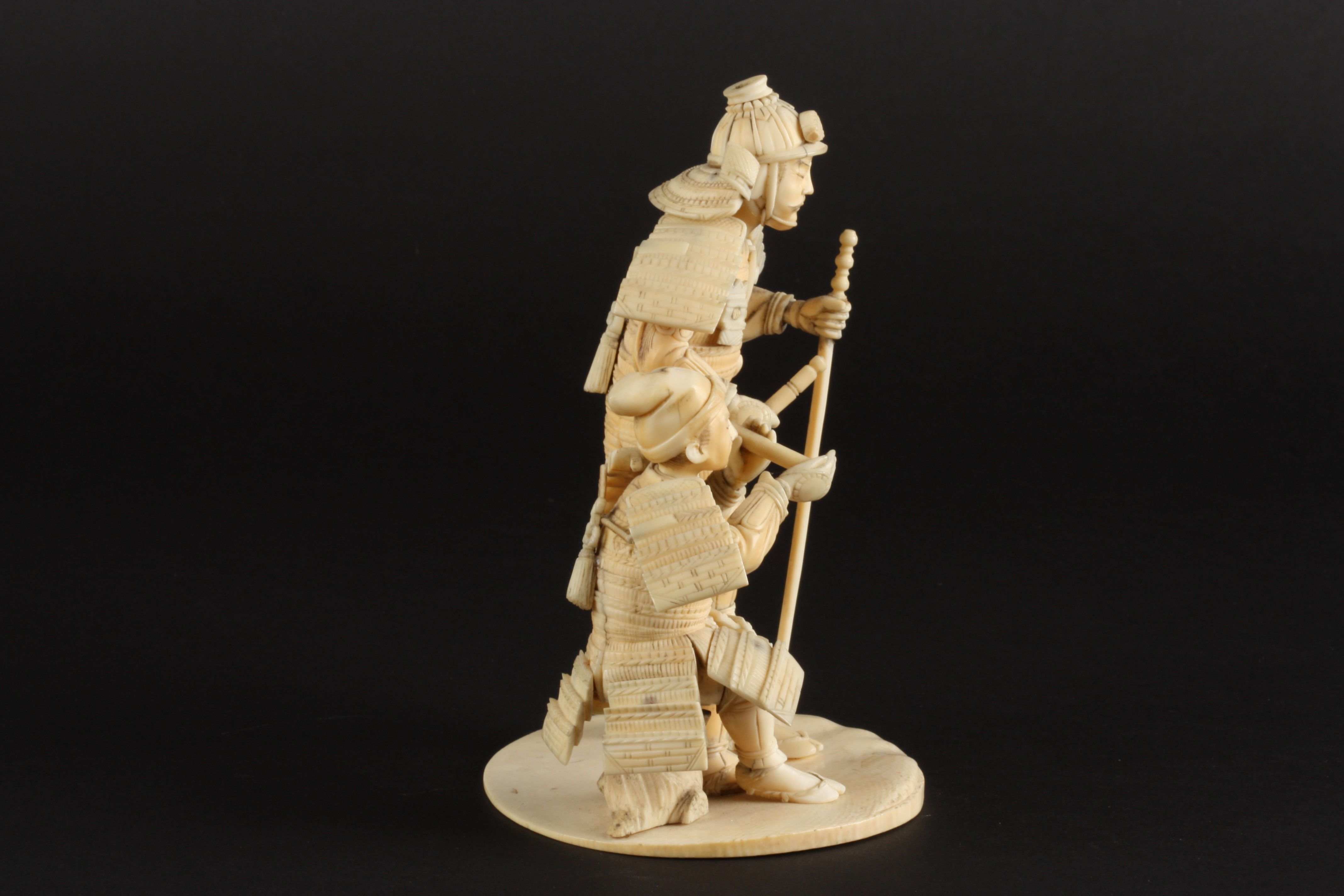 An ivory okimono figure group of two Japanese warriors
late 19th/early 20th century 
one of the - Image 3 of 4