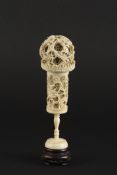 A Chinese ivory puzzle balllate 19th/early 20th centurydeeply carved with dragons, raised on