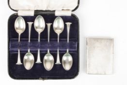 A cased set of six silver tea spoonshallmarked Sheffield 1960, together with an engine turned