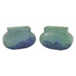 A pair of Daum frosted glass vases
the green and blue vases of oval form, signed Daum