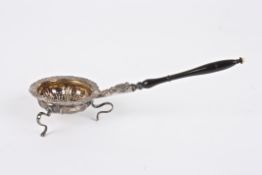 A 19th century Russian silver strainer marked Fabergewith floral mounted rim, turned wooden