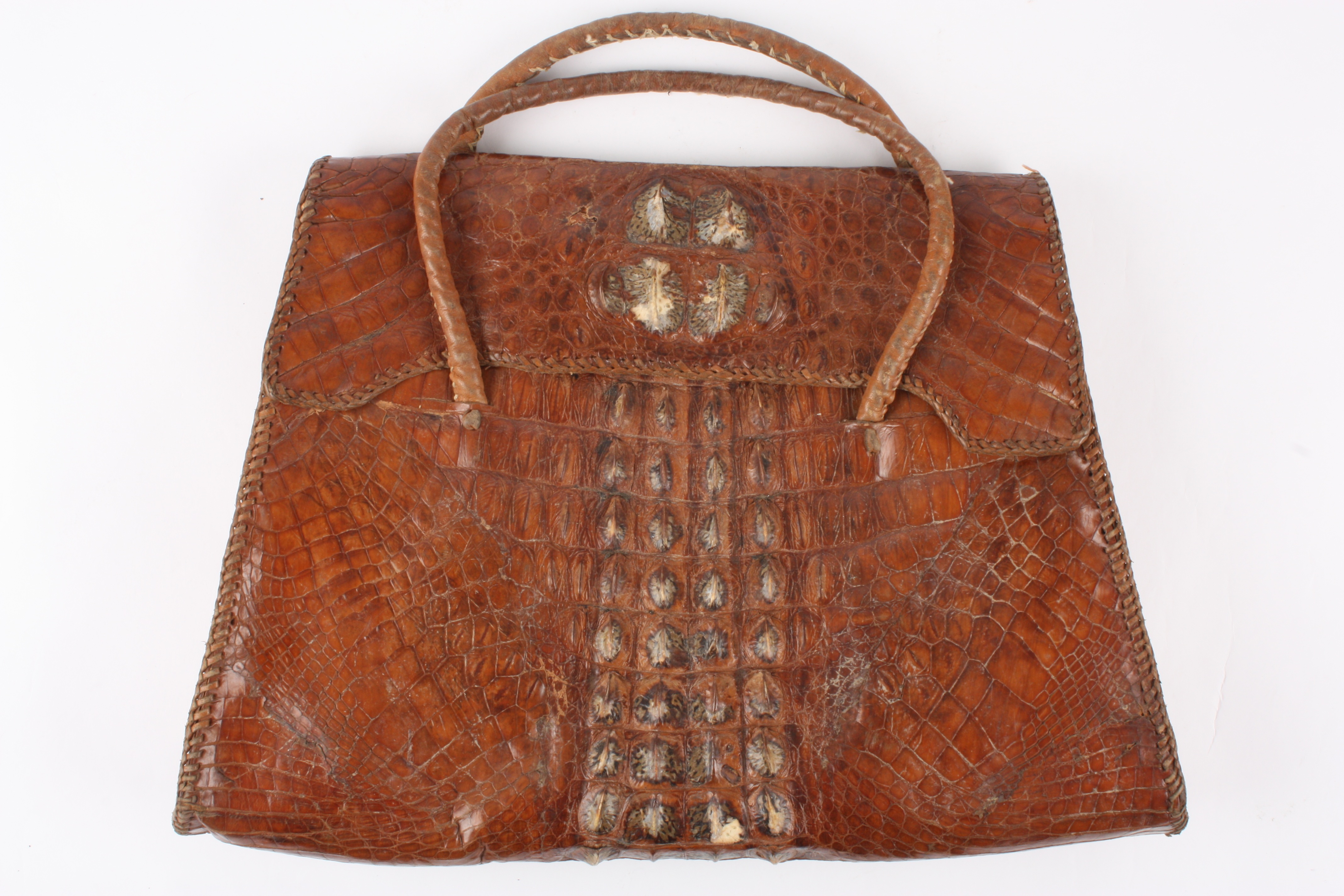 Brown alligator/crocodile skin bag.
With two sections inside.Dimensions: Condition reportFair