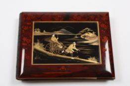 An early Japanese lacquer shibayama photo albumthe cover finely decorated with a scene of a man