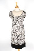 Three designer dressesincluding a red and white spot summer dress by Valentino boutique size 8, a