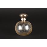 A Victorian silver and cut glass scent bottle
hallmarked Birmingham 1898, the silver top decorated