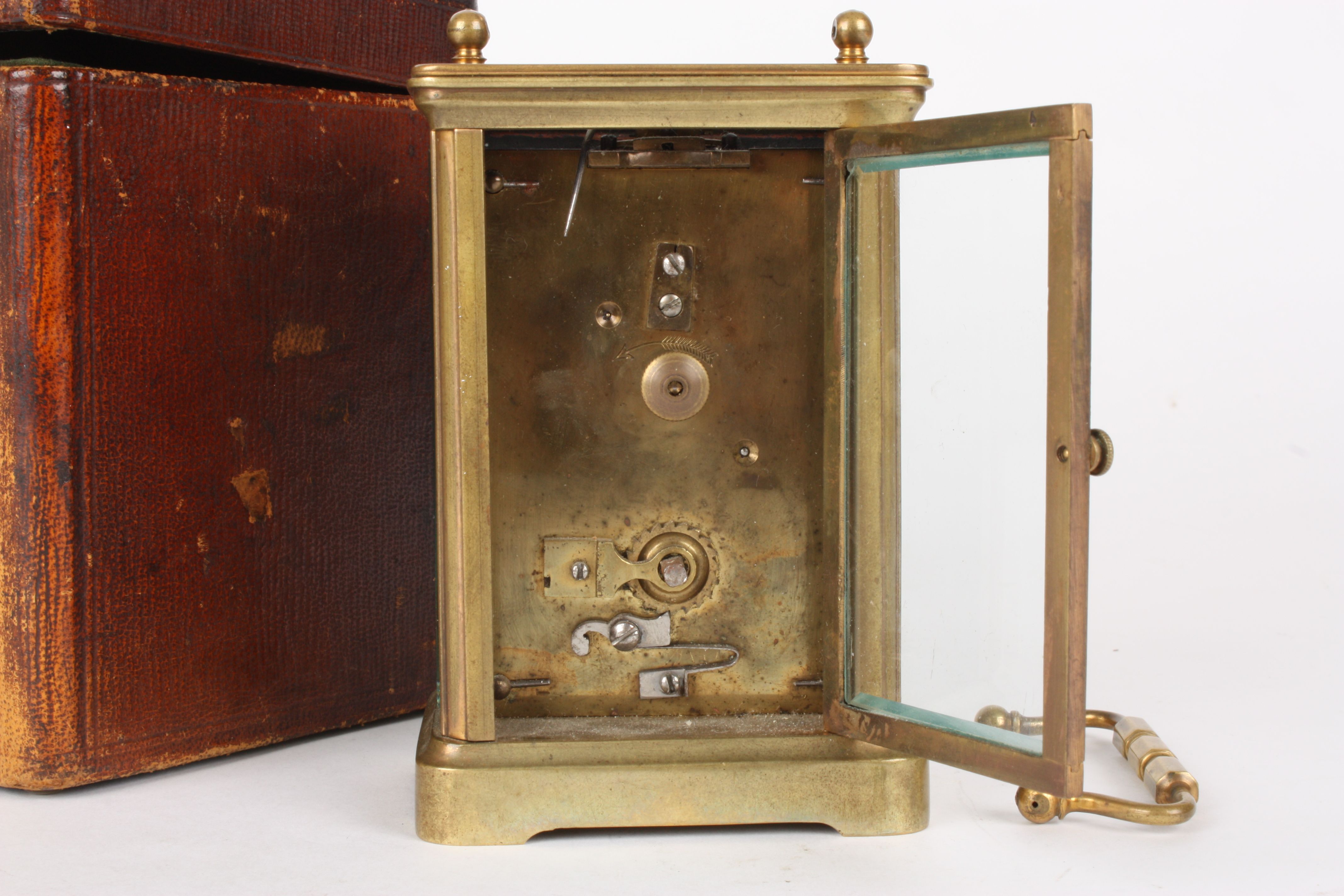 A French brass carriage clock
retailed by Drew & Sons, Piccadilly Circus, London, the plain brass - Image 3 of 3