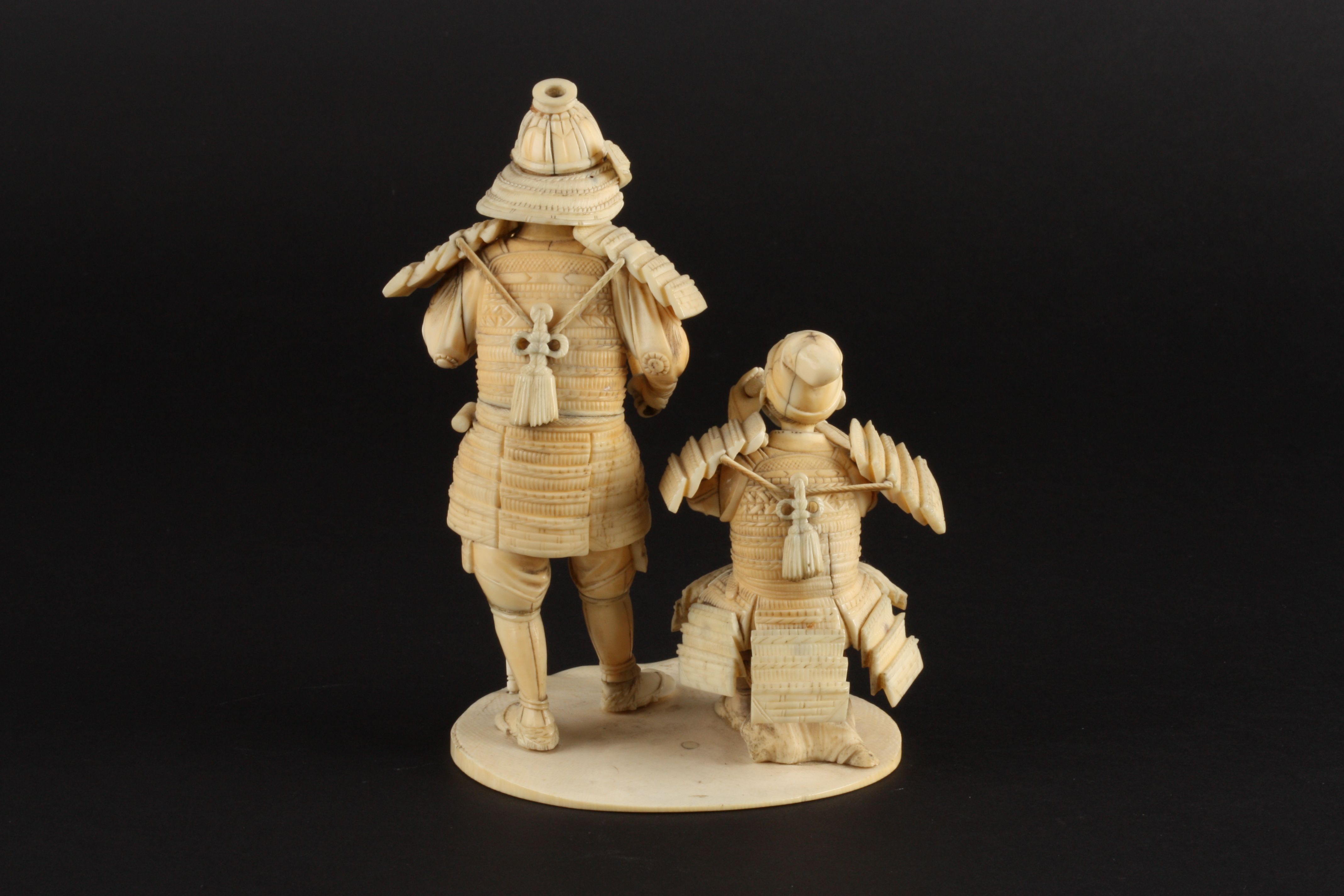 An ivory okimono figure group of two Japanese warriors
late 19th/early 20th century 
one of the - Image 2 of 4