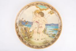 A large Victorian painted Minton charger by A.E. Blackpainted with a scene of two cherubs beside