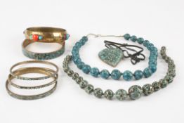 A collection of assorted costume jewelleryincluding two turquoise bead necklaces, another and
