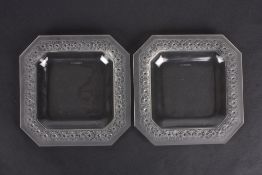 A pair of R. Lalique 'Paquerettes' square frosted glass dishesthe rims moulded with daisies, with