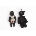 Two Schuco toy bears
both with articulated head, arms and legs.Dimensions: 9.5 and 9 cm long.