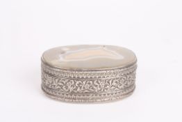 A variegated agate trinket boxof oval form in chased and repoussé silver coloured metal