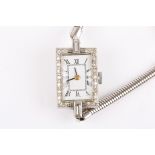 A ladies Art deco style diamond cocktail watch
the white rectangular shaped dial surrounded by small