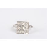 An Art Deco style 18ct white gold and diamond ring
set with nine circular diamonds of