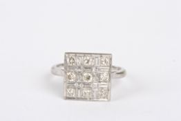 An Art Deco style 18ct white gold and diamond ringset with nine circular diamonds of
