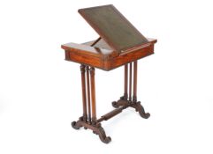 A William IV metamorphic mahogany reading tablethe tooled leather lined top raised by wooden