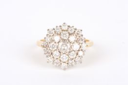 A Modern gold diamond cluster ringset with numerous brilliant cut diamonds, in claw setting