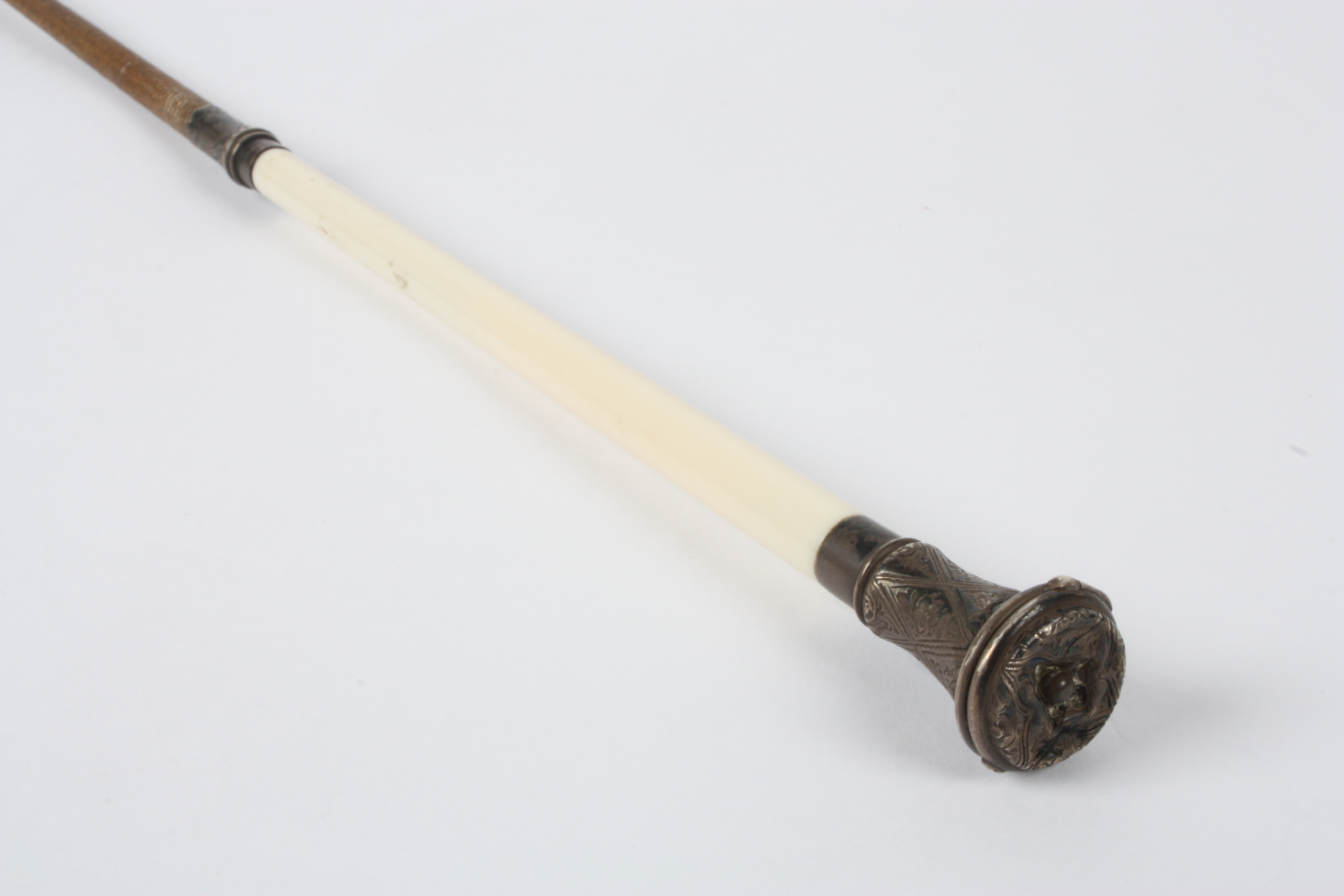 A 19th century riding crop with white metal vinaigrette
with ivory upper section surmounted by white - Image 2 of 3