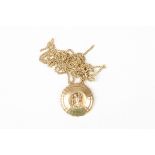 A 9ct gold St. Christopher pendant
on a 9ct gold chain.Dimensions: 10.5 grams.Condition