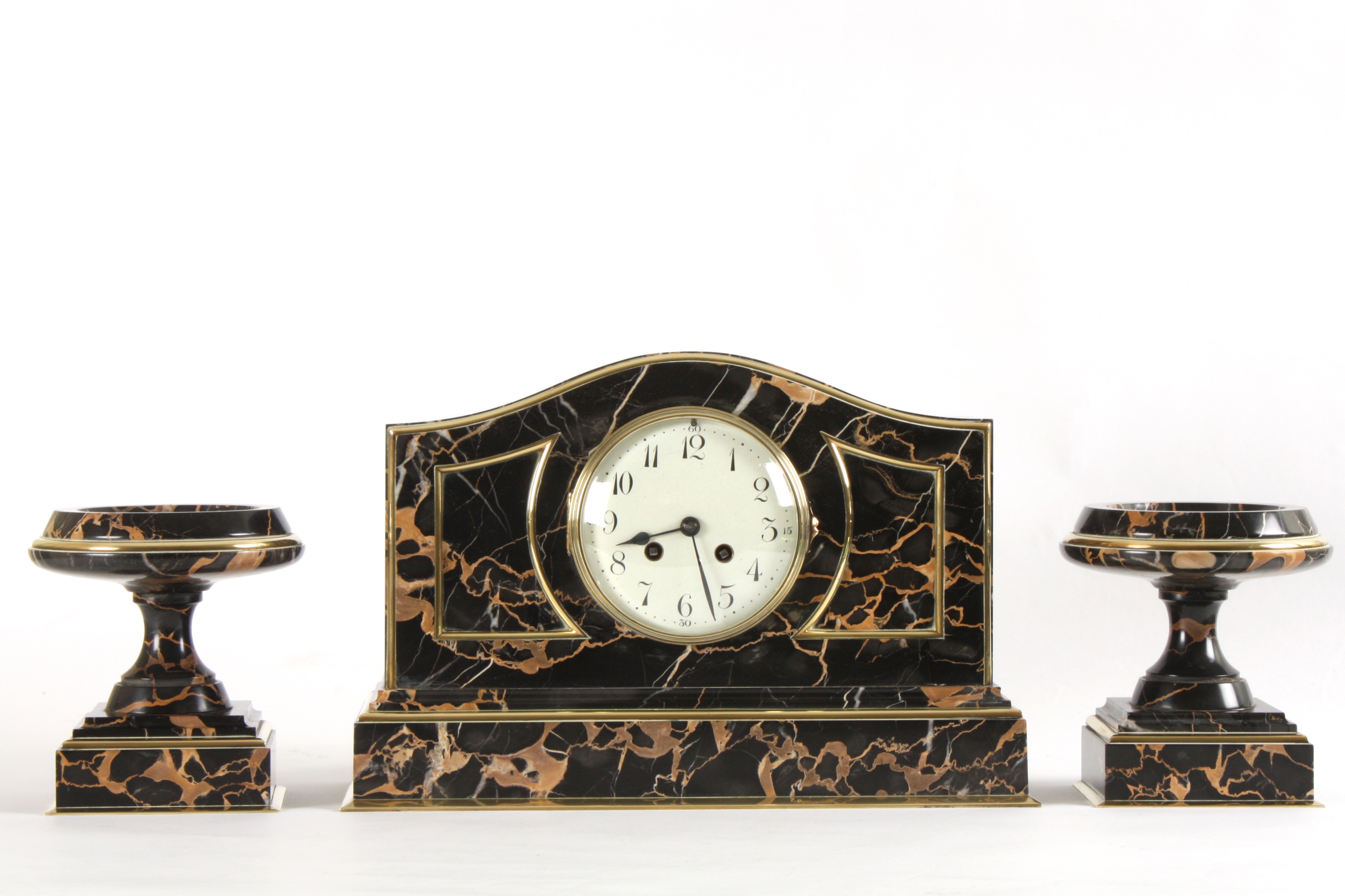 A French early 20th century marble garniture
the 4 1/2 inch enamel dial with Arabic numerals, and