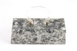 A rectangular shaped ladies Lucite handbag formerly belonging to Daphne Guinnesswith perspex handle