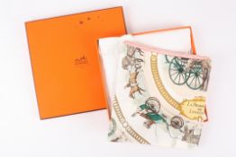 A Hermès of Paris silk scarf 'La Promenade de Longchamps'decorated with a central scene of a