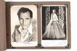 Autographs. An autograph book containing a number of photographs of film starssome signed, some