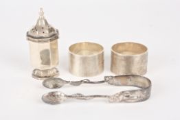 Two silver napkin ringshallmarked Birmingham 1930 with engine turned decoration and cartouches