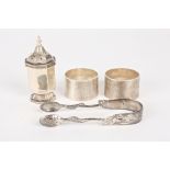 Two silver napkin rings
hallmarked Birmingham 1930 with engine turned decoration and cartouches