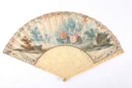 An ivory and hand painted fanthe pierced ivory guard sticks and sticks depicting ladies and