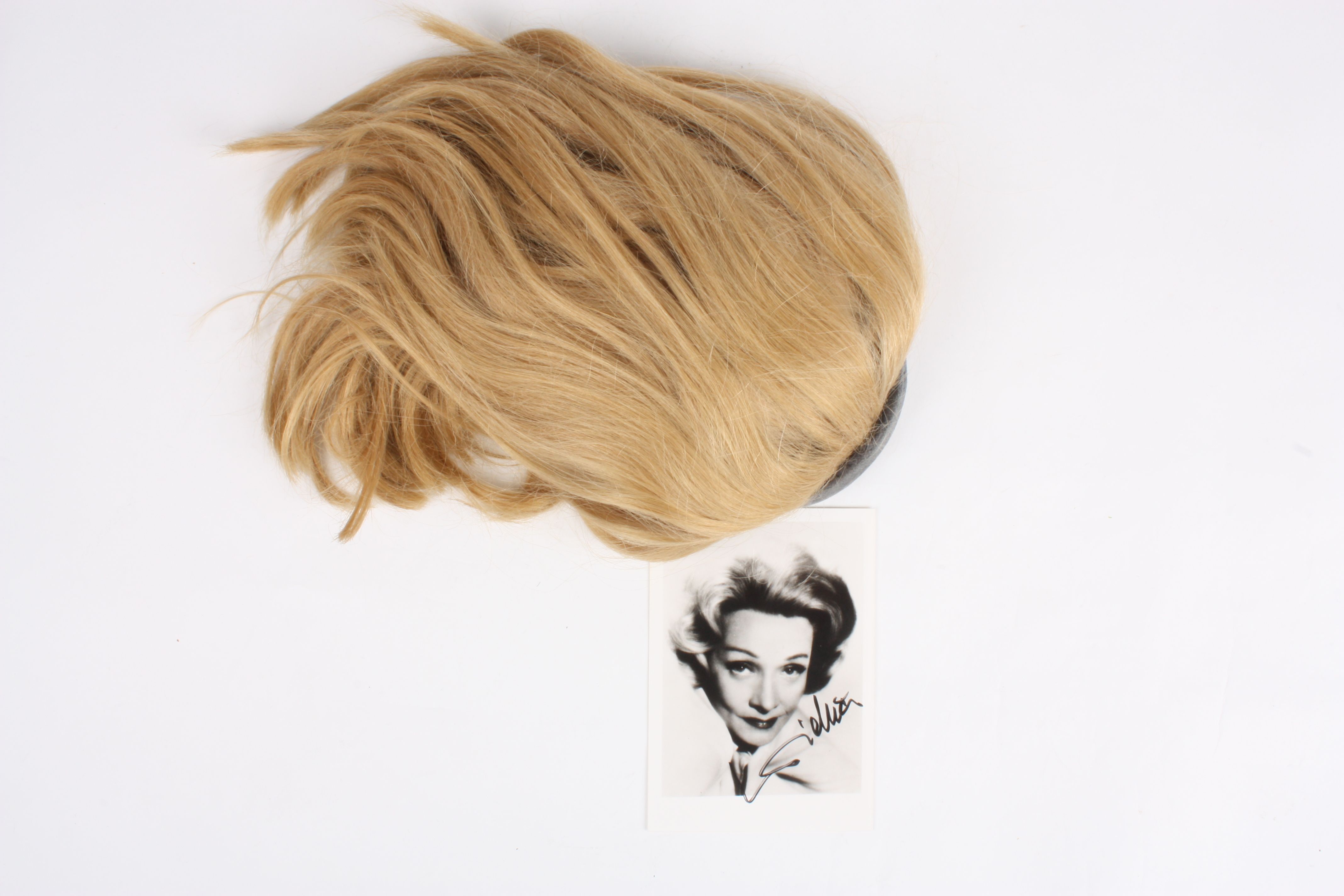 A hairpiece believed to have been worn by Marlene Dietrich
of ash blonde colour with alice band
